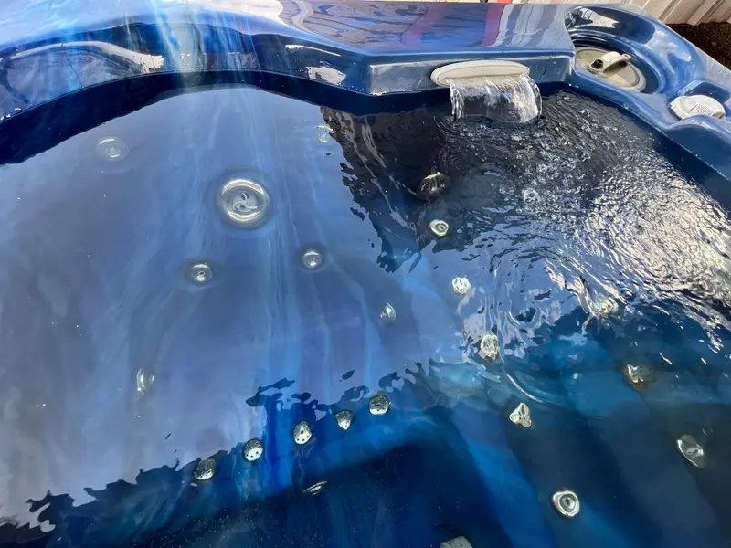 Deep blue shell under running water